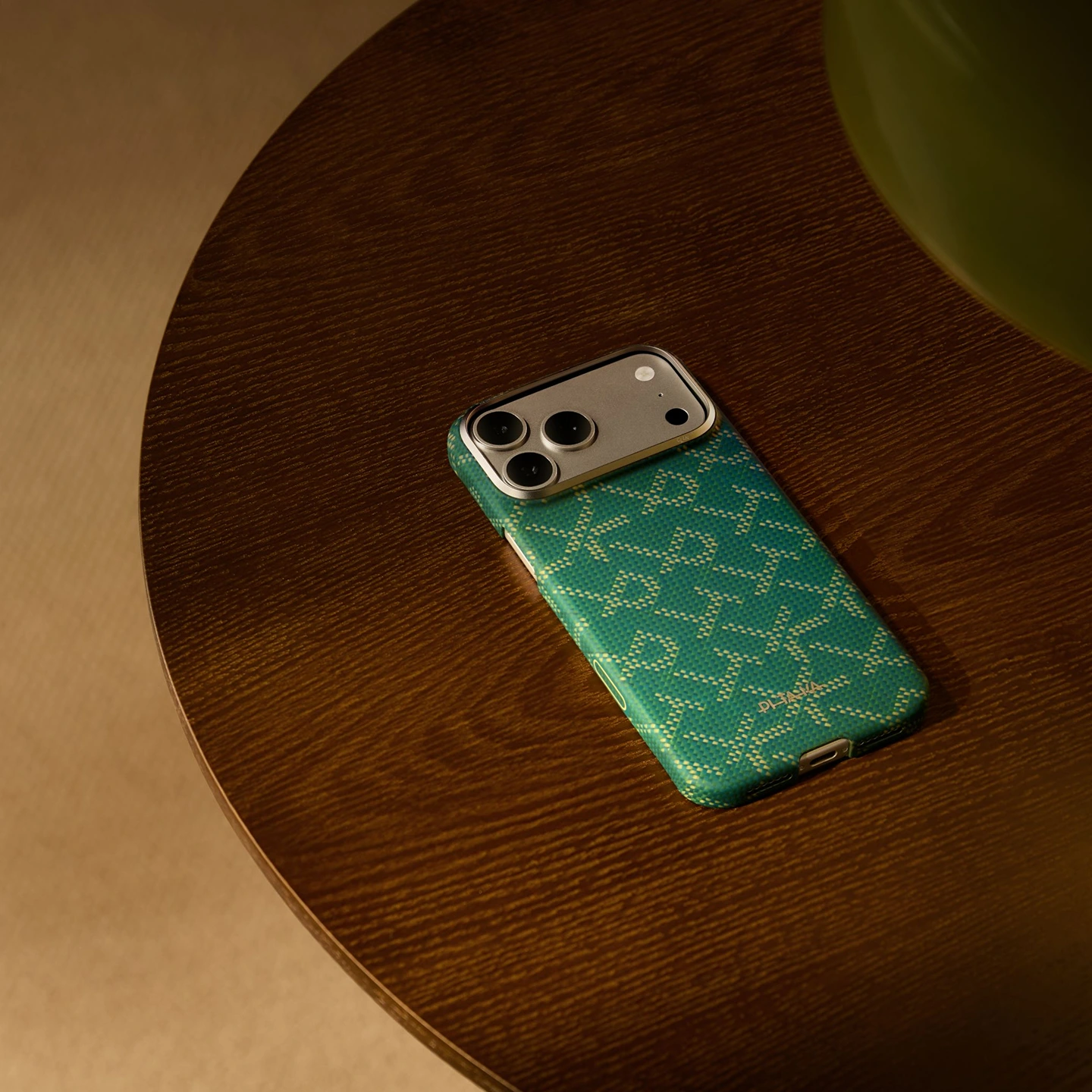 PITAKA Leaping Gold Green iPhone Edge Case lifestyle