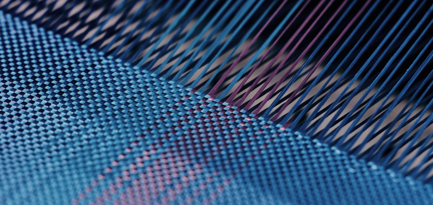 Blue aramid fibers woven into a precise pattern