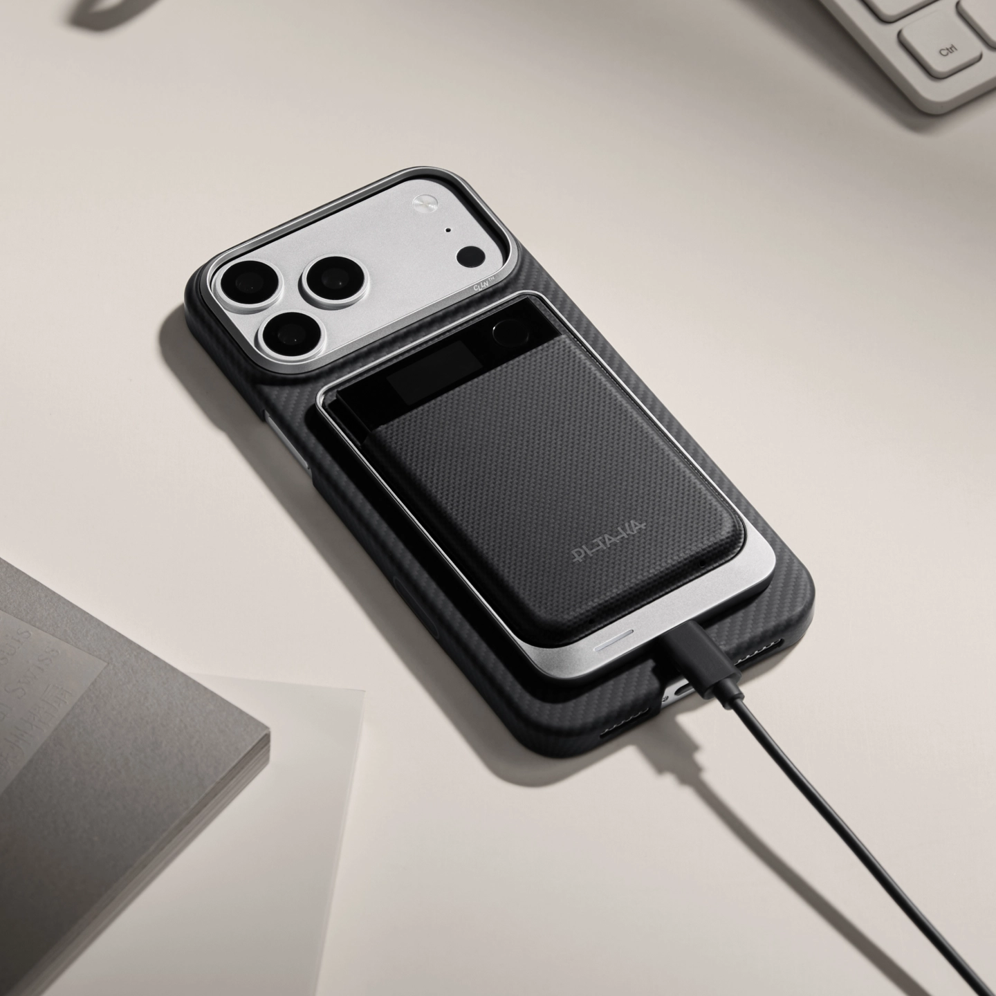Plaud Note charging on the magnetic stand with a USB-C cable