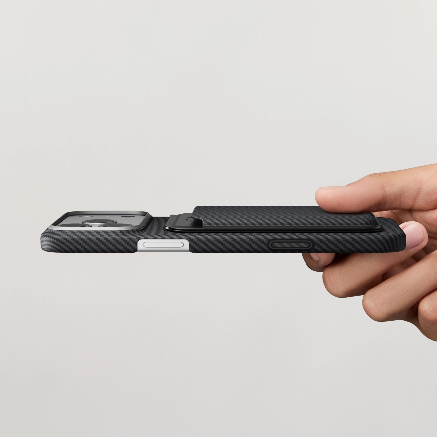 Slim side profile of the Magnetic Stand Woven Wallet attached to a phone